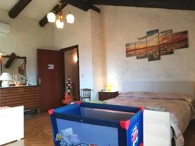 Letto o letti in una camera di La Campagnola - Casa Vacanze