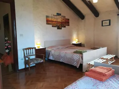 Letto o letti in una camera di La Campagnola - Casa Vacanze