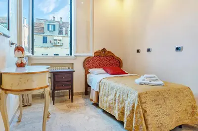 Letto o letti in una camera di Inn Venice