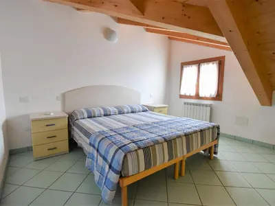 Letto o letti in una camera di Apartment Solmare-30 by Interhome