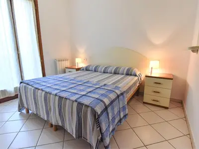 Letto o letti in una camera di Apartment Solmare-30 by Interhome