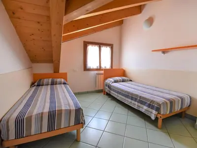 Letto o letti in una camera di Apartment Solmare-36 by Interhome