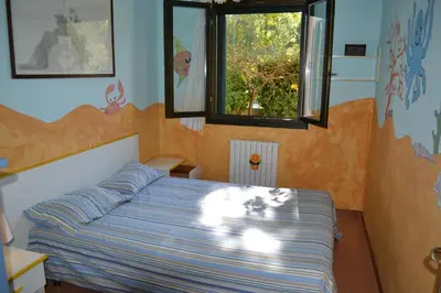 Letto o letti in una camera di Casa Teresa