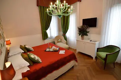 Letto o letti in una camera di B&B Villa Ines