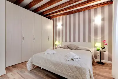 Letto o letti in una camera di Ca' della Darsena - Arsenale by Wonderful Italy
