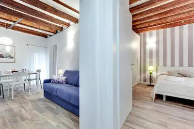 Letto o letti in una camera di Ca' della Darsena - Arsenale by Wonderful Italy