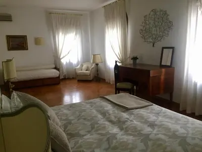 Letto o letti in una camera di Casa Lunia Guesthouse