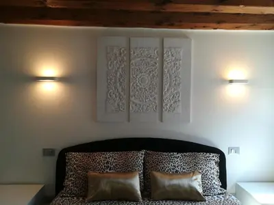 Letto o letti in una camera di Cà Mercante di Spezie