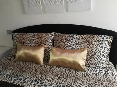 Letto o letti in una camera di Cà Mercante di Spezie