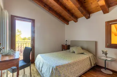 Letto o letti in una camera di Agriturismo Porcaloca