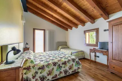 Letto o letti in una camera di Agriturismo Porcaloca