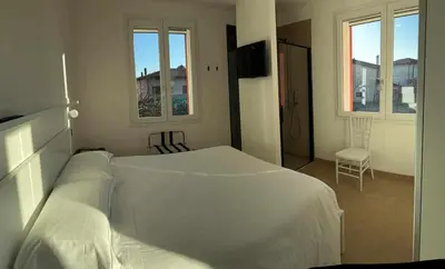 Letto o letti in una camera di Villa San Biagio Residence