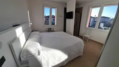 Letto o letti in una camera di Villa San Biagio Residence