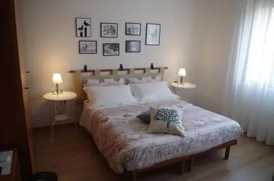 Letto o letti in una camera di Alla Torre B&B
