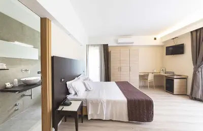 Letto o letti in una camera di Hotel Alla Corte SPA & Wellness Relax