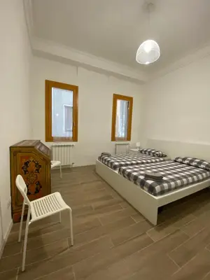 Letto o letti in una camera di Ca' Lucia Apartment