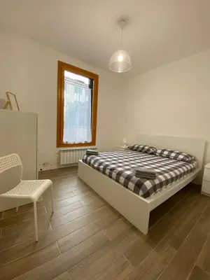 Letto o letti in una camera di Ca' Lucia Apartment