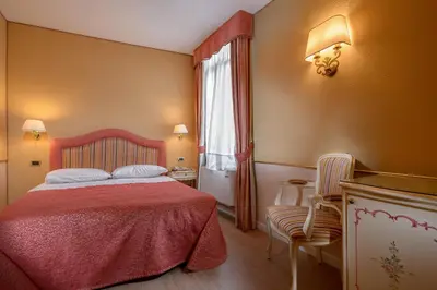Letto o letti in una camera di Casa Burchielle