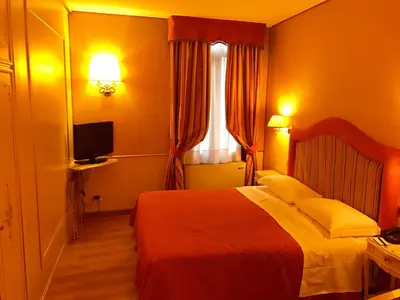 Letto o letti in una camera di Casa Burchielle