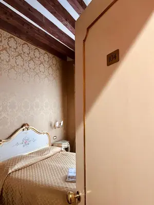 Letto o letti in una camera di Locanda Correr