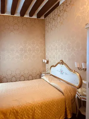 Letto o letti in una camera di Locanda Correr