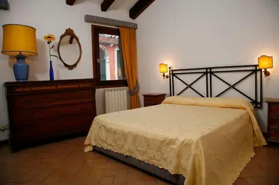 Letto o letti in una camera di Venice Salute Apartments
