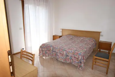 Letto o letti in una camera di Condominio York