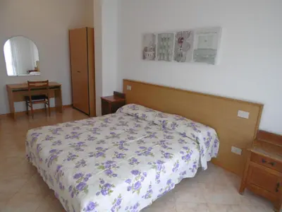 Letto o letti in una camera di Condominio York