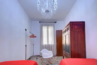 Letto o letti in una camera di SUNNY Ghetto CANALVIEW