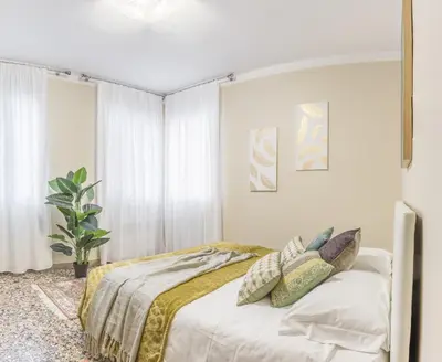 Letto o letti in una camera di San Marco Square with Canal View by Wonderful Italy
