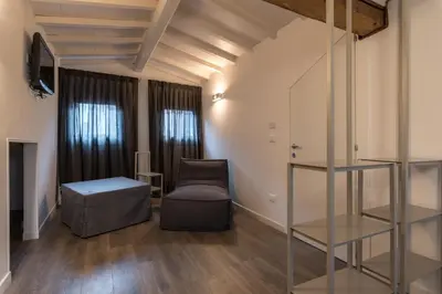 Letto o letti in una camera di La Loggia della Luna