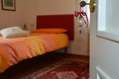 Letto o letti in una camera di B&B LE ORTENSIE
