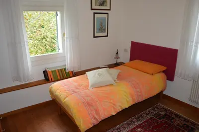 Letto o letti in una camera di B&B LE ORTENSIE