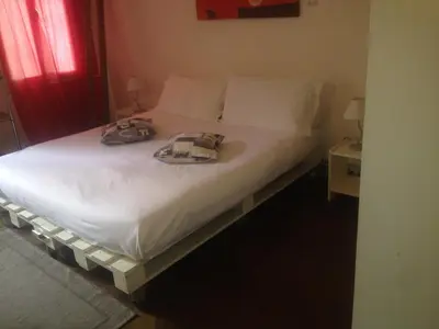 Letto o letti in una camera di 19 Borgo Cavour