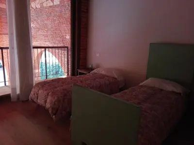 Letto o letti in una camera di Agriturismo La Sophora