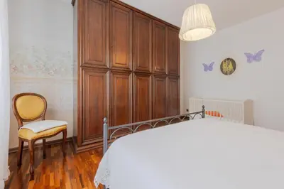 Letto o letti in una camera di Talamini