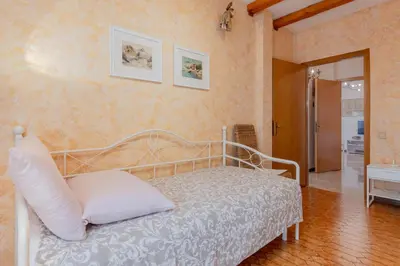 Letto o letti in una camera di Talamini