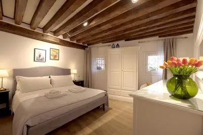 Letto o letti in una camera di Mascherone Apartment
