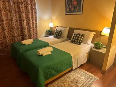 Letto o letti in una camera di Hotel Raffaello Venice