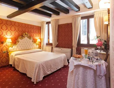 Letto o letti in una camera di Ca' Della Loggia