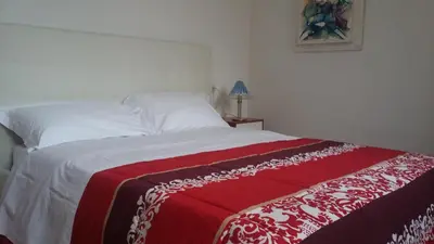 Letto o letti in una camera di alloggi Alba 1