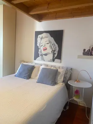 Letto o letti in una camera di Casa vacanze Chez la Reine - holiday home Vicenza