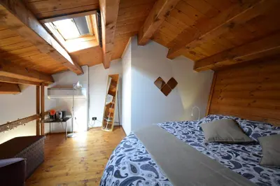 Letto o letti in una camera di Casa vacanze Chez la Reine - holiday home Vicenza