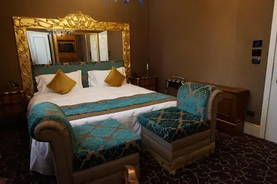 Letto o letti in una camera di Pesaro Palace