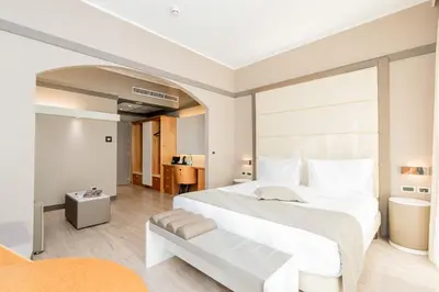 Letto o letti in una camera di Park Hotel Ai Pini & Restaurant Ai Pini