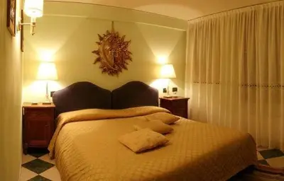Letto o letti in una camera di Cà Satriano