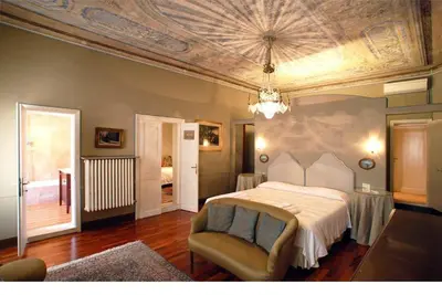 Letto o letti in una camera di Cà Satriano