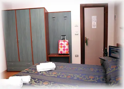 Letto o letti in una camera di Hotel American