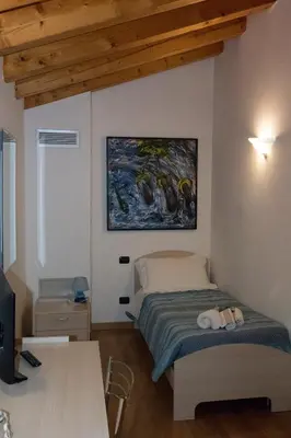 Letto o letti in una camera di VillaRosa