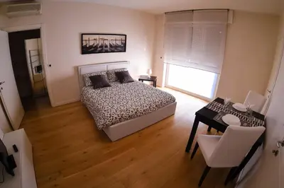 Letto o letti in una camera di 4YOU APARTMENTS - PONTI ROMANI